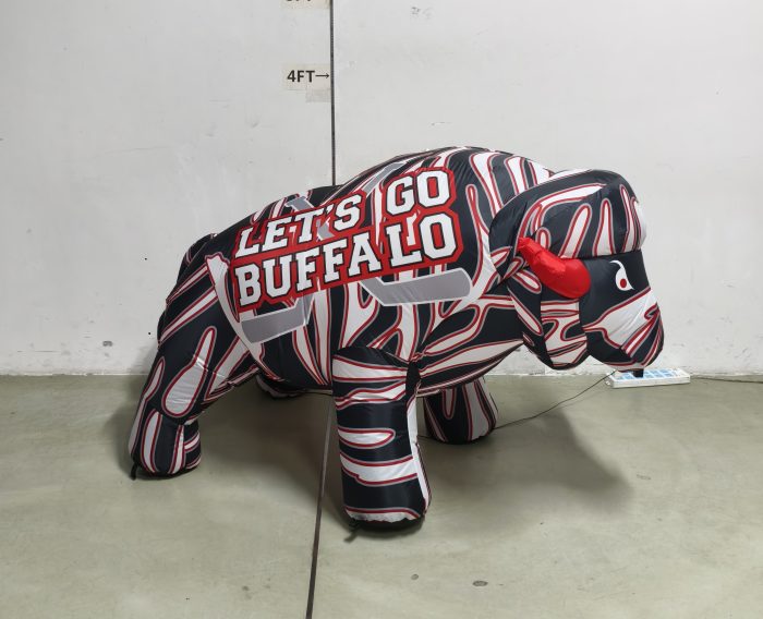 Red, white and black hockey Buffablo inflatable outdoors, daytime 75-degree view