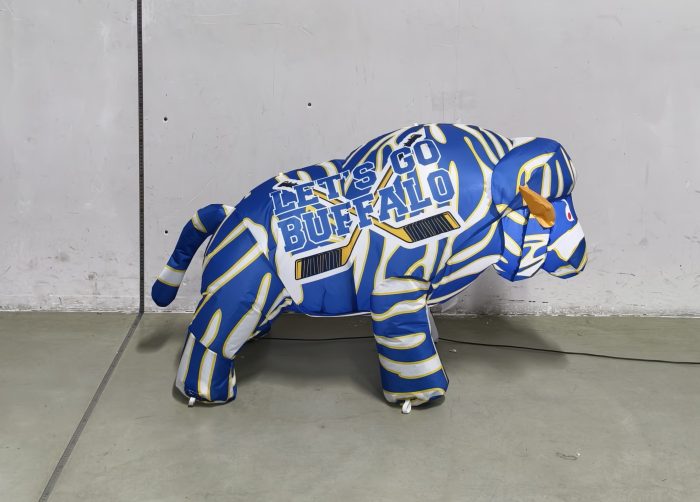 23-inch blue, white and gold striped hockey baby BuffaBlo, daytime side view