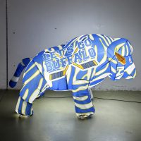 23-inch blue, white and gold buffalo hockey inflatable glowing with LED lights, side view
