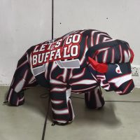 23-inch red, white and black striped hockey baby BuffaBlo, side angle view