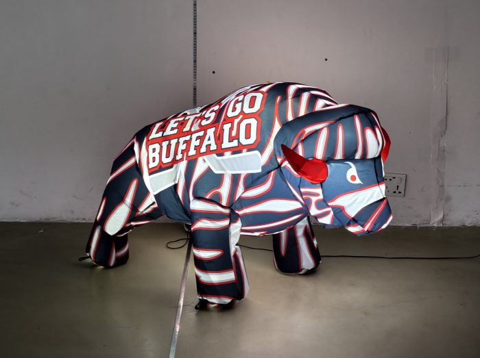 23-inch buffalo hockey inflatable baby size glowing with LED lights at night
